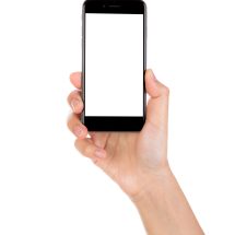 Hand holding mobile smart phone with blank screen Isolated on white background